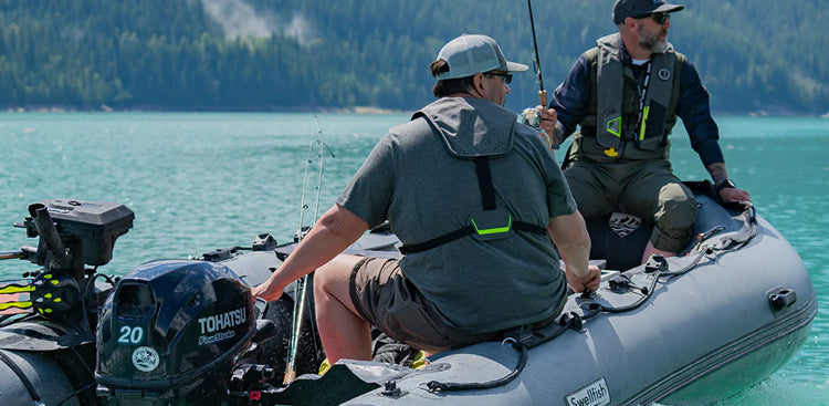People fishing on a Classic Inflatable Boat featuring the Ocean Angler Combo accessory package
