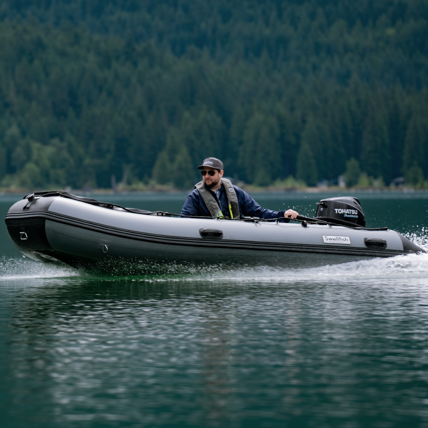 A Classic 390 traveling across the lake, this is the perfect family fishing boat. 