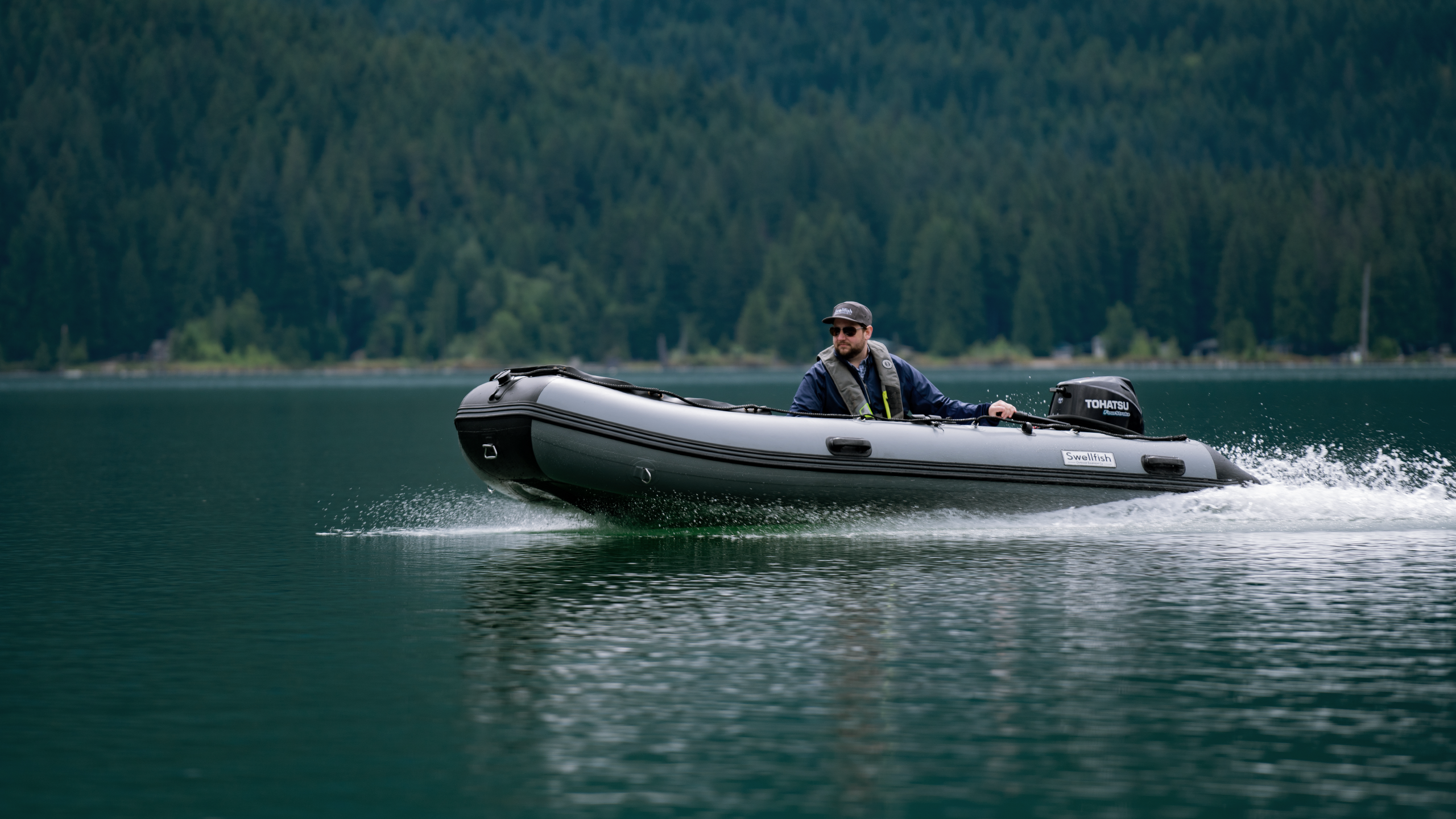 A Classic 390 traveling across the lake, this is the perfect family fishing boat. 
